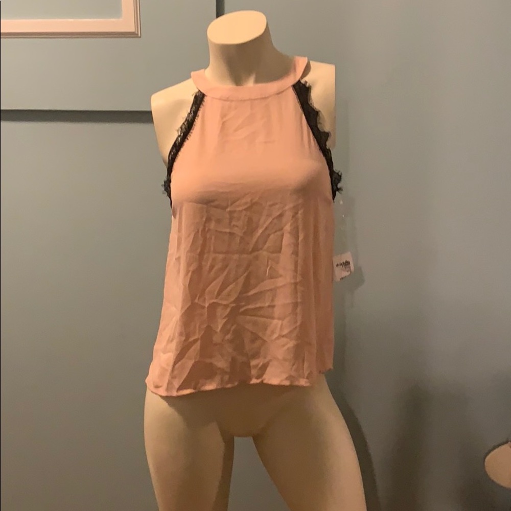 Pink sleeveless blouse